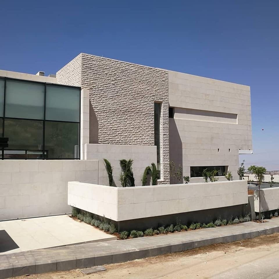 Modern cube-form stone house
