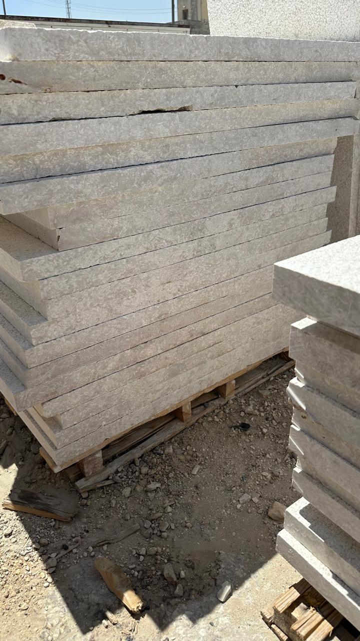 Finished natural stone surface